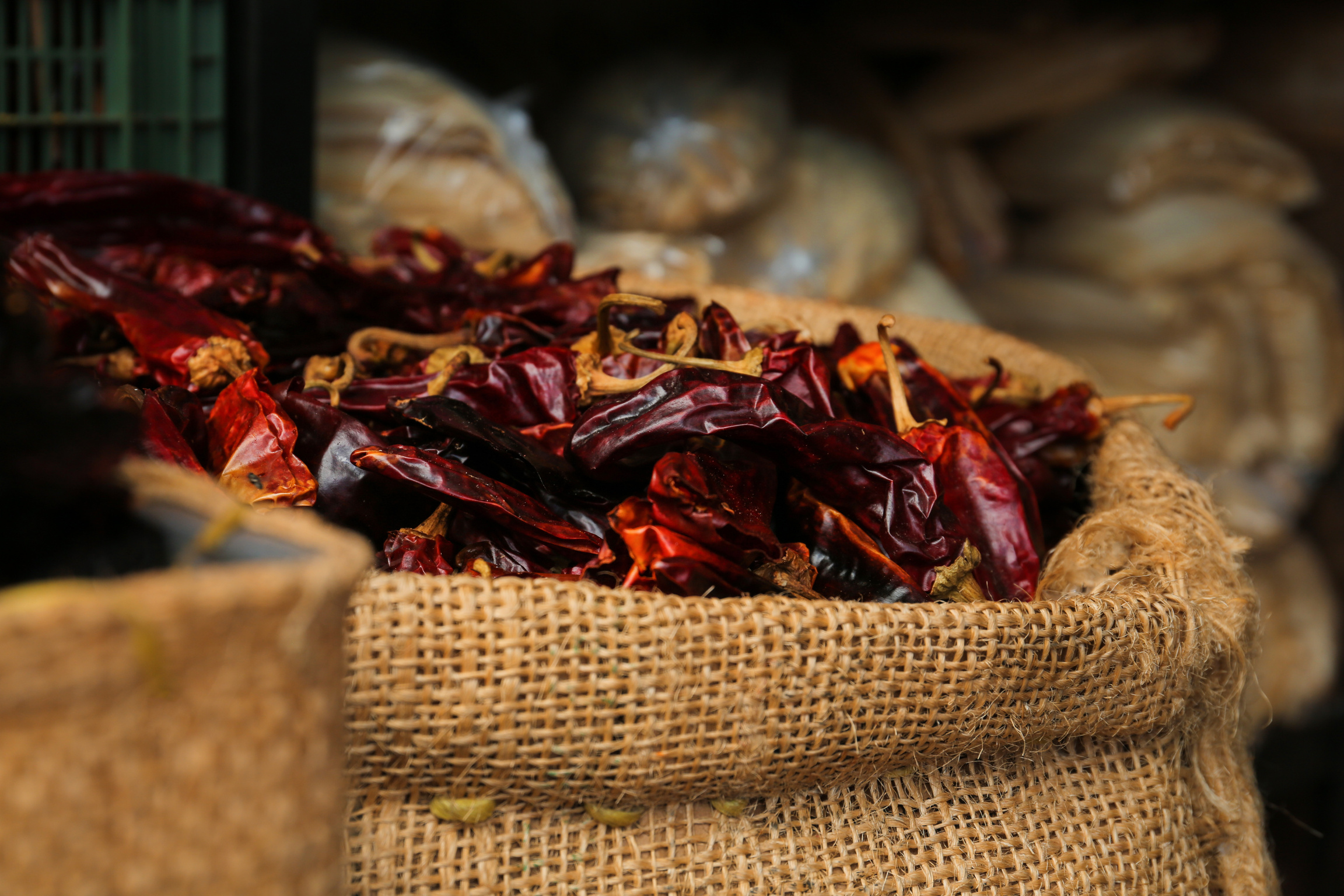 Pile of Dried Guajillo Peppers in Burlap, Closeup